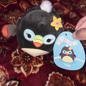 Original Squishmallows Tito Penguin Plush - Black with Yellow Flower